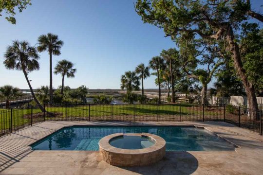 luxury patio pool with hot tub